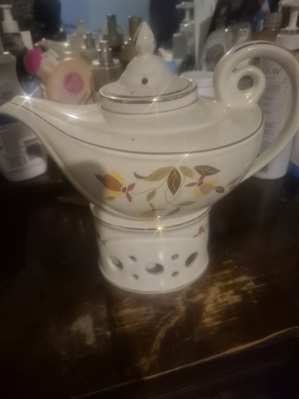 White Ceramic Tea Warmer with Yellow and Brown Floral Accent